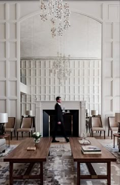 a man standing in the middle of a living room
