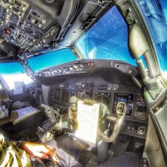 the cockpit of an airplane with multiple instruments