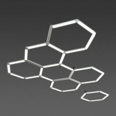 the light fixture is shaped like hexagons