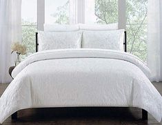 the comforter is white in color and it looks like they are made from linen