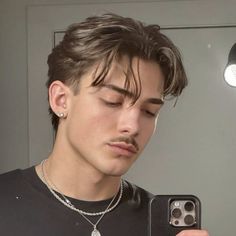 @elijah_forcier BASED Pomade – the ultimate solution for achieving stylish, long-lasting hair that stands out. Crafted for both men and women, BASED combines premium ingredients with an innovative formula to provide superior styling control without compromising hair health. Infused with natural ingredients like bentonite clay and nourishing essential oils, it provides a matte finish while adding texture and volume to all hair types. Elevate your hair game with this sophisticated Hair Clay and achieve that perfect, lived-in look! Middle Part Haircut, Hair Pomade Men, Boyfriend Hair, Mens Haircuts Straight Hair, Cortes De Pelo Largo Para Hombres, Middle Part Hairstyles, Mens Hairstyles Thick Hair, Wavy Hair Men, Men Hair Color