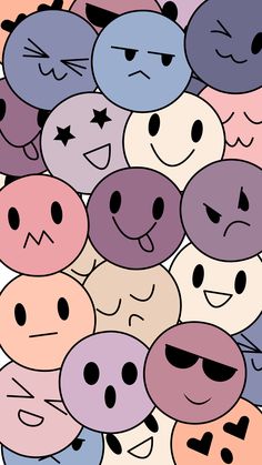 a bunch of different colored smiley faces on a white background