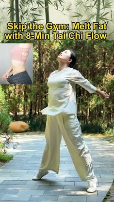 a woman in white shirt and pants doing yoga with bamboo trees behind her on the sidewalk