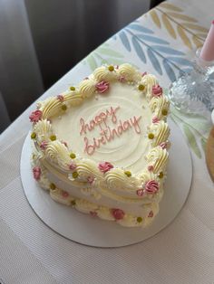 a birthday cake sitting on top of a table