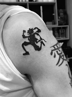 a man with a tattoo on his arm