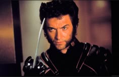 a man holding a knife in his right hand