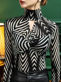 Elegant High Neck Elastane Tops, Elegant Fitted Purple Blouse, Elegant High Neck High Stretch Tops, Elegant High Stretch High Neck Tops, Elegant Slim Fit Striped Tops, Elegant Long Sleeve Blazer With Houndstooth Pattern, Elegant Striped Slim Fit Top, Gothic Fashion Black Blouse, Elegant Long Sleeve Purple Blouse