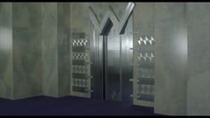 an open door in a room with geometric designs on the walls