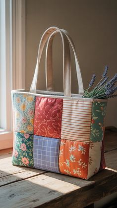 a multicolored bag sitting on top of a wooden table next to a window