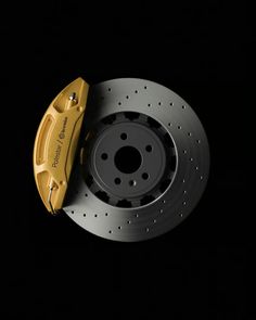 an image of brakes and pads on a black background