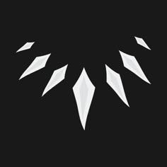 an abstract black and white background with geometric shapes in the shape of snowflakes