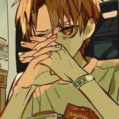 an anime character with red eyes and brown hair holding his hands up to his face