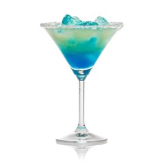 a blue and green drink with ice cubes on the rim in a martini glass