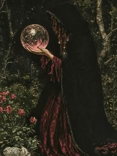 a painting of a woman holding a crystal ball