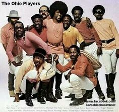 a group of black men posing for a photo