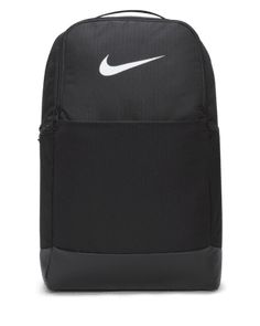 Grab your gear and get going with the Nike Brasilia Backpack. It has plenty of pockets to help you stay organized including a sleeve to fit your laptop, side mesh pockets for water bottles and a zippered pocket on the inside to keep small items secure. This product is made with at least 50% recycled polyester fibers. Shown: Black/Black/White Style: DH7709-010 Track Backpack, Black Backpack Nike, Nike Backpack For Training, Nike Backpack For Gym, Nike Black Backpack For Daily Use, Nike Bag, Nike Bags School, Nike Black Backpack For School, Nike Academy Backpack