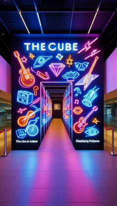 the entrance to the club is lit up with neon lights