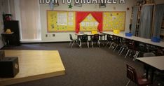 an empty classroom with chairs and desks in front of the wall that says how to organize a theatre classroom