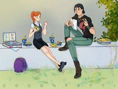 a man and woman sitting on a bench next to each other