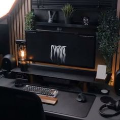 a computer desk with a monitor and keyboard on it