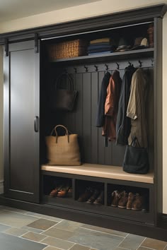 a coat rack with shoes and bags on it