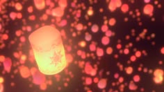 an image of a lantern in the sky with boket lights around it and blurry background