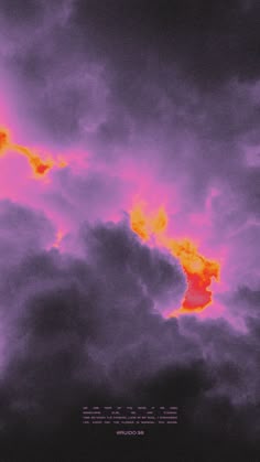 the sky is very dark and cloudy with some orange clouds in front of it,