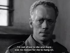 a man in uniform is looking at the camera with a caption that reads, i'm not afraid to die and there was no reason for me to hang on