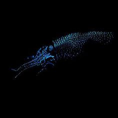 a lizard is lit up in the dark with blue dots on it's body