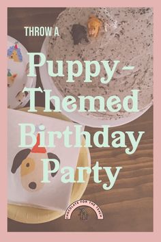 a dog themed birthday party with cake and napkins on the table in front of it