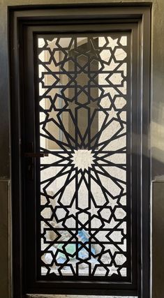 a door with an intricate glass design on it