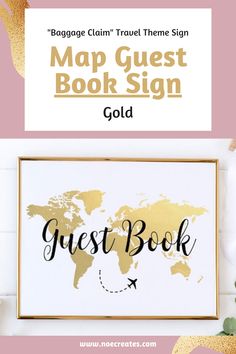 a map with the words guest book and gold foil lettering on it, in front of a