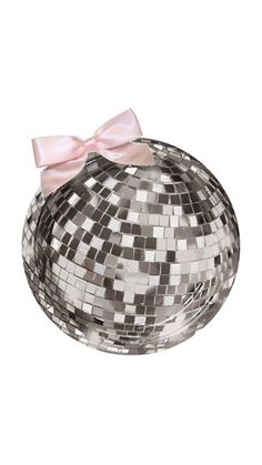 a silver disco ball with a pink bow on it