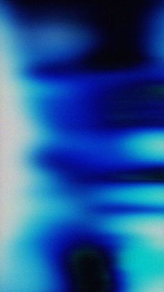 blurry photograph of blue and white lines