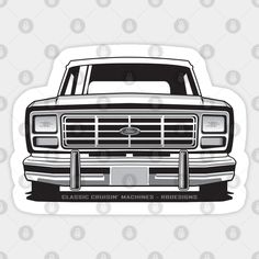 a black and white truck with the words classic cumin machines on it's hood