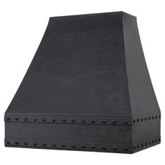 a black metal stove hood with rivets on the sides and an exhaust vent