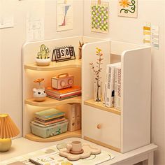 a room with a desk, bookshelf and other items on the shelves in it