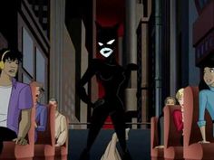 an animated image of a catwoman standing in the middle of a group of people