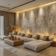 a modern living room with large couches and lamps on either side of the wall