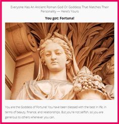 the head and shoulders of a statue of a woman with grapes on her shoulder, in front of a building