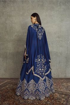 Buy Purple Raw Silk Cape Set by Designer JAYANTI REDDY Online at Ogaan.com Luxury Embroidered Traditional Wear With Cape Sleeves, Lehenga Designs With Cape, Luxury Embroidered Choli With Cape Sleeves, Lehenga With Cape, Lehanga With Capes, Lehenga Cape, Purple Lining Cape Design, Lehnga With Cape Jacket, Luxury Lehenga With Floral Embroidery And Cape Sleeves