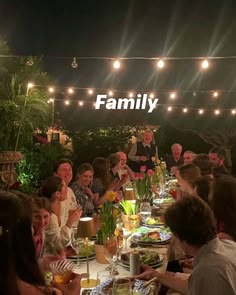 a group of people sitting around a dinner table