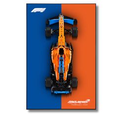 an orange and blue race car is shown on the cover of a magazine or brochure