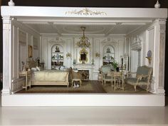 a doll house with furniture and accessories in it