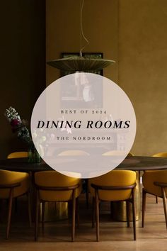 the dining room table is surrounded by yellow chairs