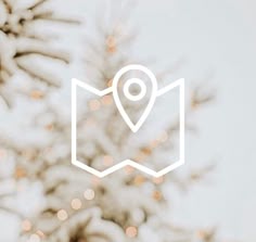 a close up of a map with a tree in the background