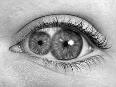an eye is shown with long eyelashes