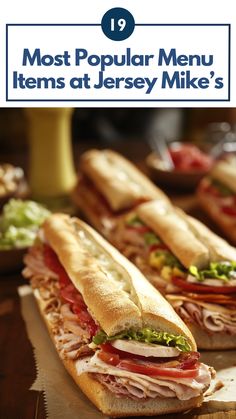 A Jersey Mike's subs, including the #13 Original Italian and #7 Turkey & Provolone, displayed on a table.
