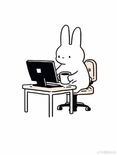 a rabbit sitting at a desk with a laptop and coffee cup in front of it