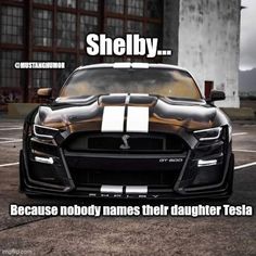 a black sports car parked in a parking lot with the caption shely because nobody names their daughter tesa